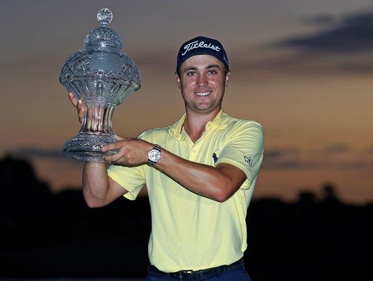 Justin Thomas with Honda Classic trophy