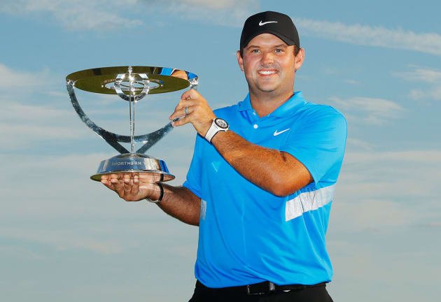 Patrick Reed with the Northern Trust trophy