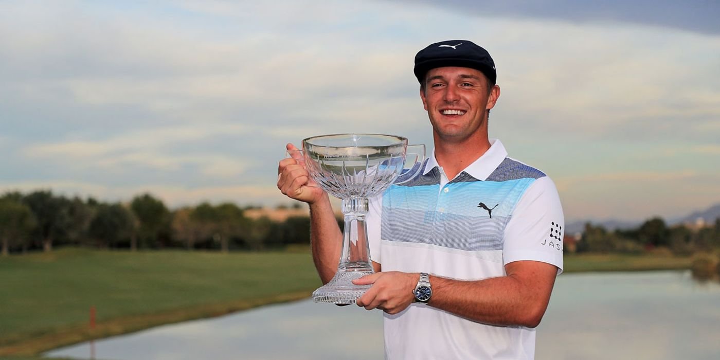 Bryson DeChambeau holds the Shriners trophy