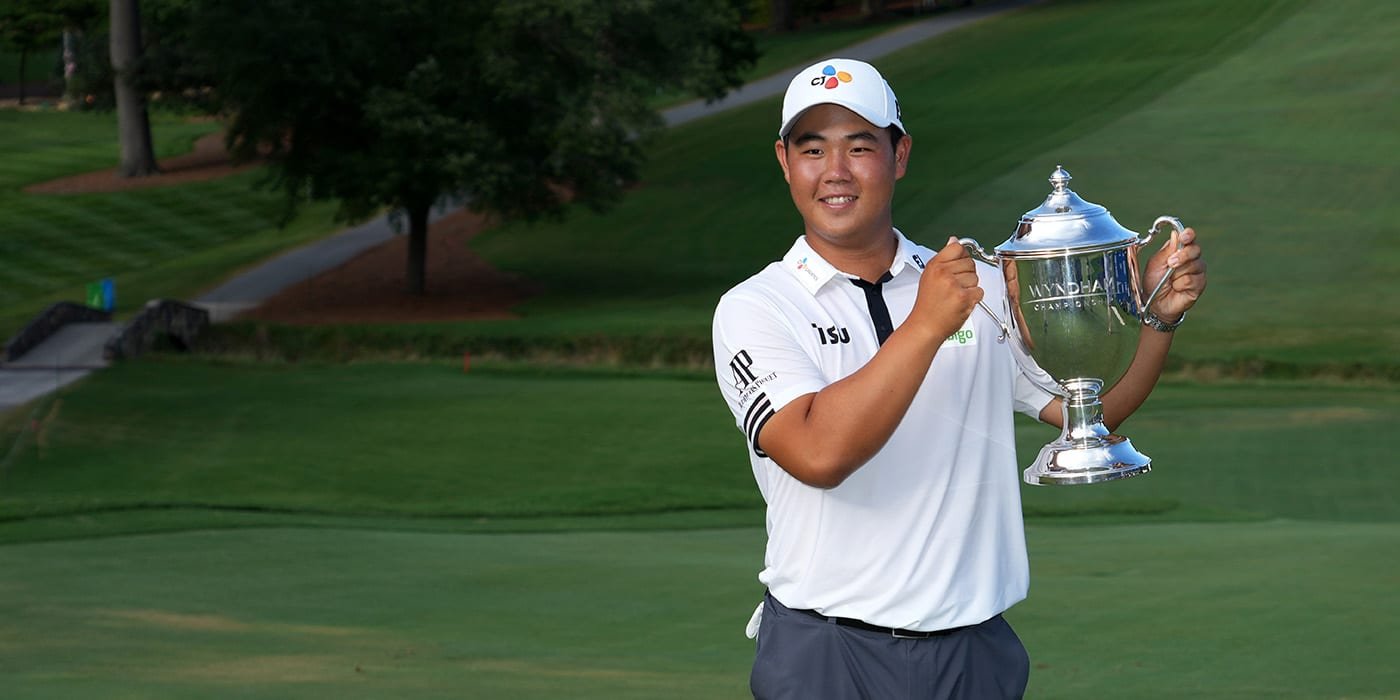 Tom Kim with Wyndham trophy