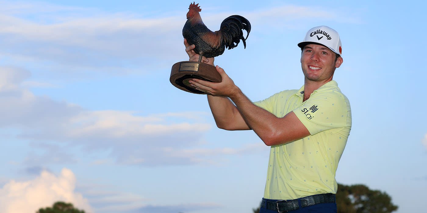 Sam Burns with Reveille the Rooster