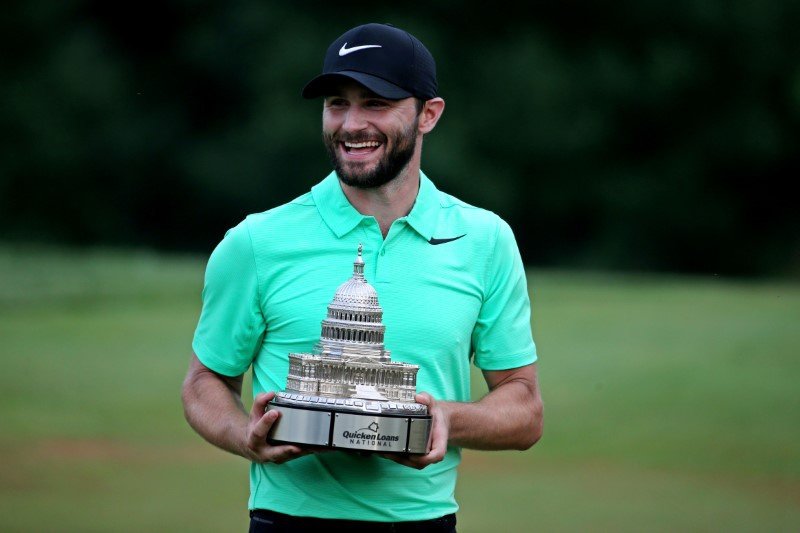 Kyle Stanley with Quicken Loans trophy