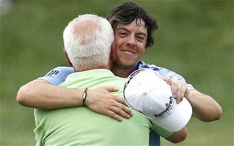 Rory hugs his dad