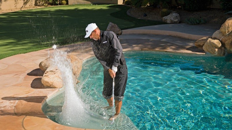 Stan Utley pitching from a swimming pool