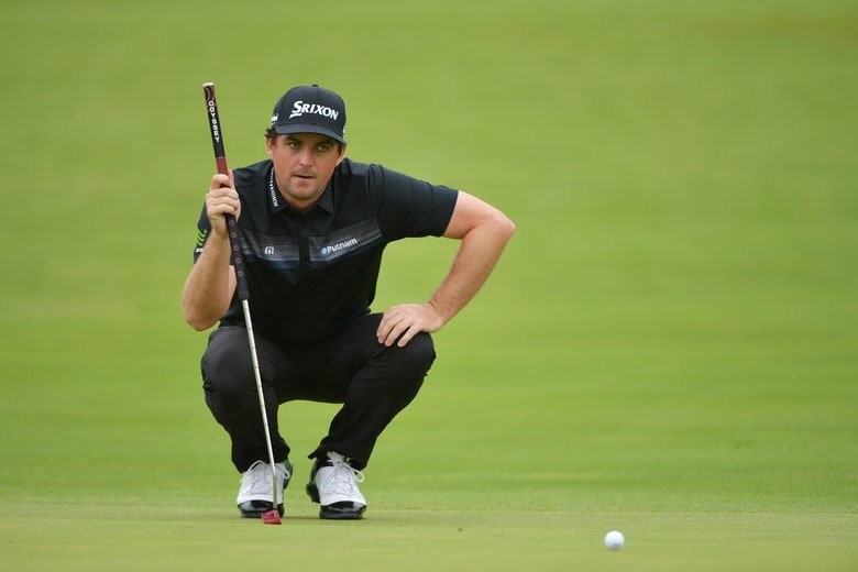 Bradley lines up a putt at BMW