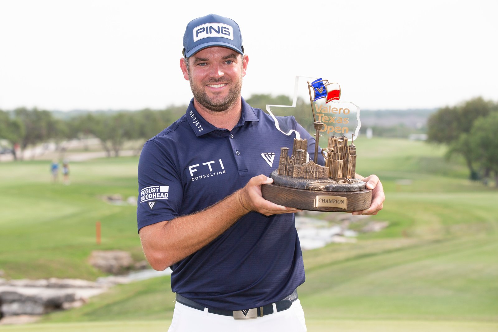 Corey Conners with Valero trophy